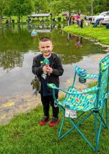 Jayce Hersi has a catch on his line at the Trout Derby on Saturday, May 18 at Station Park in Sparta. (Photos by Nancy Madacsi)
