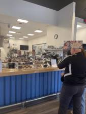 Patrons pick up fresh treats at the Bake Shop. (Photos provided)