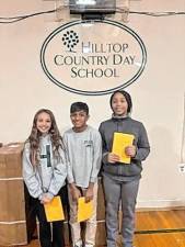 From left are first-place DAR essay contest winners fifth-grader Mikayla Bautista, sixth-grader Ahrin Kabse and seventh-grader Katie Tedesco of Hilltop Country Day School in Sparta. (Photo provided)