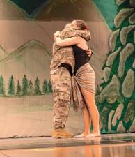 HH1 1st Sgt. James McGoonan of Wantage hugs his daughter Dona during the annual holiday performance of Dance Expression Dance Arts on Dec. 7. In honor of Pearl Harbor Day, the show concluded with a performance to ‘I’ll Be Home for Christmas’ dedicated to those serving in the U.S. military. (Photos by Geo Kumetz)