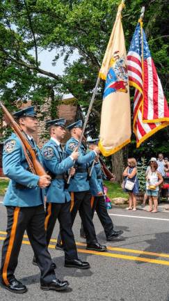 Sparta police march in the parade.