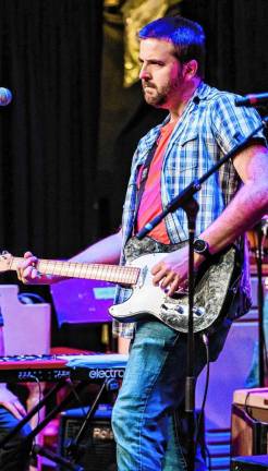 <b>Brian St. John will play Friday night at McQ’s Pub at Lake Lenape in Newton. (Photo by Julian Huarte)</b>