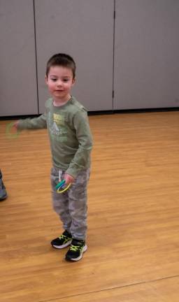 Silas Begley plays the ring toss.