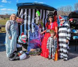 Patty Regan and Susan, Mike and Kaitlyn Long, dressed as ‘Beetlejuice’ characters, during the Harvest Festival &amp; Trunk or Treat on Saturday, Oct. 26 in Sparta. (Photo by Nancy Madacsi)