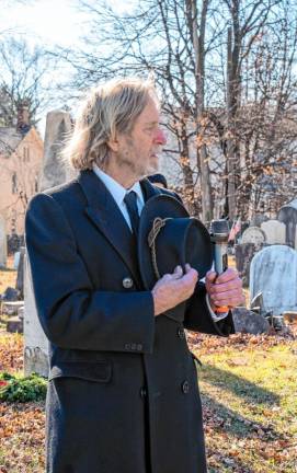 Gerald DeGroot recites the Pledge of Allegiance. (Photo by Nancy Madacsi)