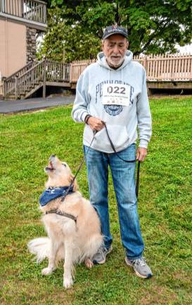 Les Cahn with Dunkin, a Golden Retriever.