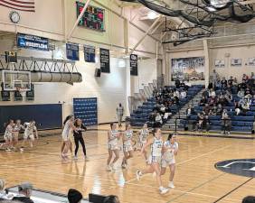 The Sparta High School girls basketball team wins the Hunterdon/Warren/Sussex Tournament on Friday, Feb. 21. (Photo by Aidan Mastandrea)