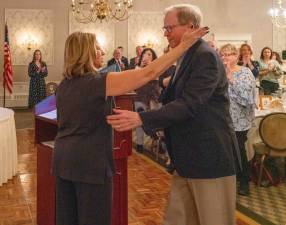 PIX1 The Sussex County Chamber of Commerce president, Tammie Horsfield, greets Richard Lecher, who won the Lifetime Achievement Award. (Photo provided)