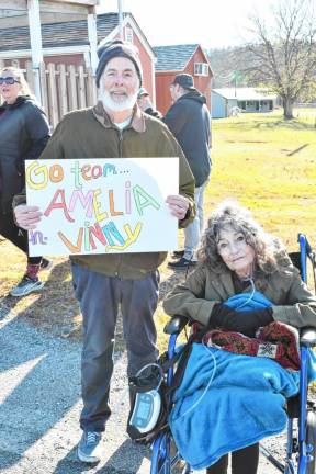 <b>Kevin and Mimi Averill of Pompton Lakes cheer on Team Amelia and Vinny.</b>