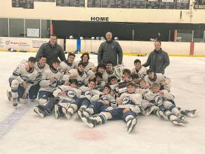 The Pope John XXIII Regional High School ice hockey team wins the Egan Cup Championship for the second year in a row. (Photo courtesy of Mara Bars)