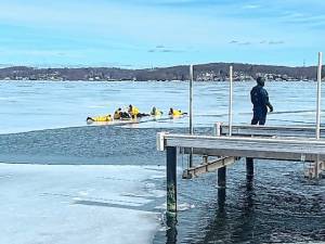 ICE1 First-responders rescue a man who fell through the ice on Lake Hopatcong on Wednesday, Feb. 19. They had been taking part in an ice rescue training exercise when they heard about the emergency. (Photos provided)