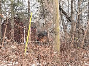 Firefighters and police responded to a shed fire on Pinecone Lane in Sparta on Tuesday, Feb. 25. The Sparta Detective Bureau is investigating the cause of the fire. (Photo by Lt. Joseph Antonello)