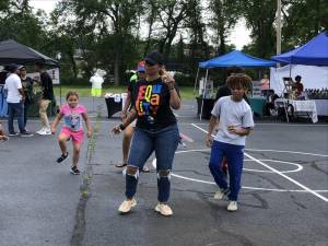 Members of the crowd dance at the Juneteenth celebration Monday, June 19 in Newton. (Photos by Kathy Shwiff)