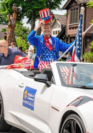 A Knights of Columbus car carries ‘Uncle Sam.’