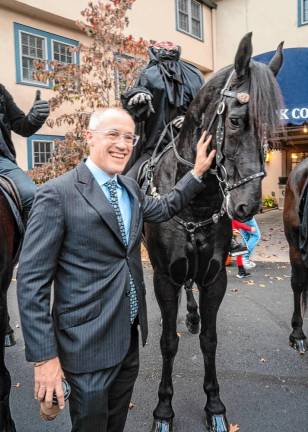 Mayor Neill Clark poses with the Headless Horseman.