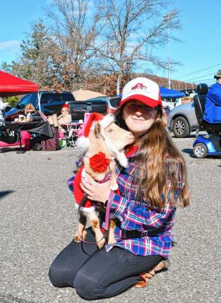 Gianna Dettorre of Blairstown with her goat, Lucy, who posed for photos with shoppers.