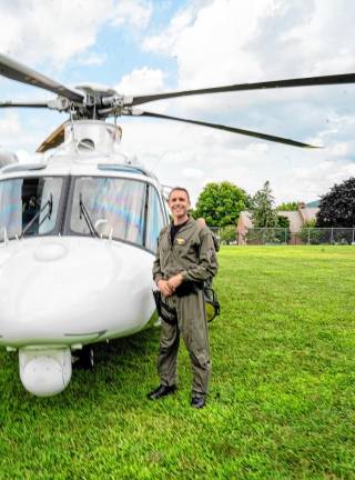 State Police Trooper Chris Campana pilots the helicopter.