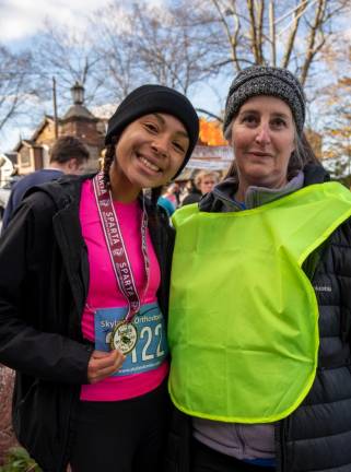 Jaylyn Barkley, the top female finisher, with her medal.