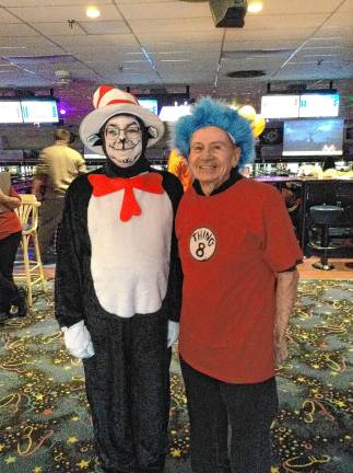 LH2 Douglas Harte, dressed as the Cat in the Hat, with his father, Lawrence. They practiced together at Harte Orthodontics in Sparta. The practice hosts an annual Halloween party.