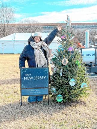 Sparta High School art teacher Christine O’Brien-Mase stands by the New Jersey state Christmas tree in Washington. (Photos provided)