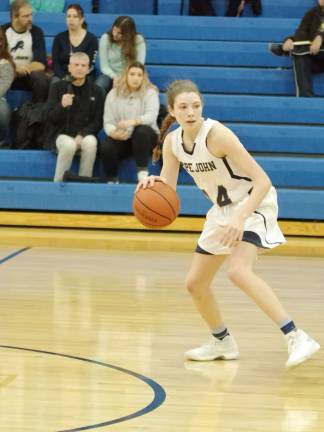 Pope John's Kenna Squier scored a game-high 25 points. Squier also grabbed 10 rebounds and made two assists. Photos by George Leroy Hunter