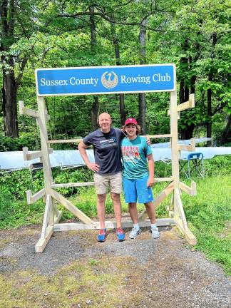 ES1 Mike Crane, left, of Crane Carving with Andrew Wilson, who built a rack to store oars for the Sussex County Rowing Club as his Eagle Scout project. (Photo provided)