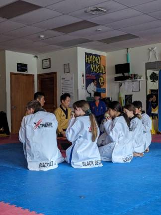 7 get black belts in Taekwondo