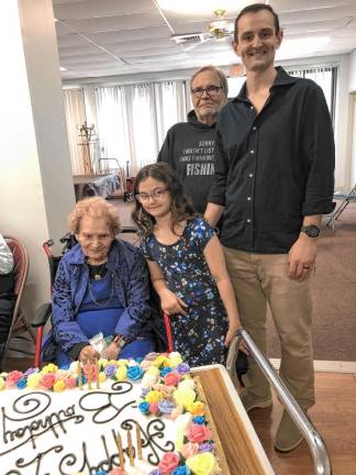 From left are Jennie Switzer; her great-granddaughter Ava Paladini, 8; her son, Dennis Paladini; and her grandson Brad Paladini.