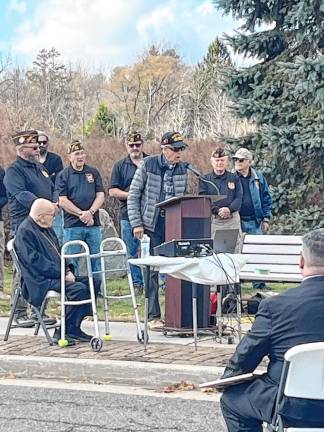 Veteran Willie Kegelman speaks at the ceremony.