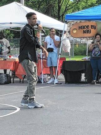 Lorant Mena, H3AL’s director of impact education, performs at the Juneteenth celebration.