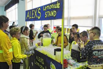 AL1 Fourth-graders at Reverend George A. Brown Memorial School in Sparta sell lemonade to raise money for childhood cancer research. (Photo provided)