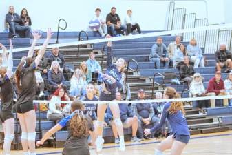 Sparta's Aralyn Saulys hits the ball in the semifinal round of the NJSIAA North Jersey, Section 1, Group 2 tournament at home Nov. 9. The Spartans beat Demarest 25-23, 25-10. Saulys made four kills, five digs and seven assists. (Photos by George Leroy Hunter)