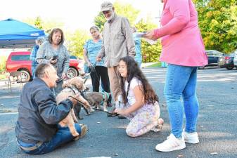 The Rev. Dr. Jack DiMatteo blesses a dog named Kingston. The annual blessing of the animals is held near Oct. 4, the Feast Day of St. Francis of Assisi, a patron saint of animals. (Photo by Maria Kovic)