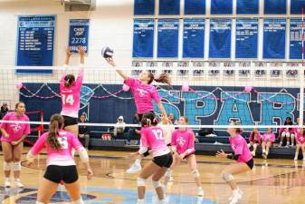 Sparta's Sylvia Przydzial gets a hand on the ball above the net in the game against Roxbury at home Oct. 14. The Spartans won 25-22, 25-20. (Photos by George Leroy Hunter)