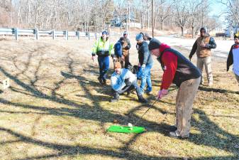 <b>Golfers take part in the annual Chili Open Golf Classic fundraiser Saturday, Feb. 1 at the Sussex County Fairgrounds in Augusta. (Photo by Maria Kovic)</b>