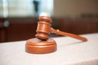 Couple pleads guilty to fraud, money laundering