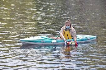 Alexandra of Troop 1151 Byram lays wreath on Cranberry Lake in memory of first responders and service members the community has lost. (Photo provided)