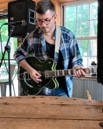 <b>Justin Cole will play a mix of rock from the 1990s to today on Saturday afternoon at Angry Erik Brewing in Newton</b>. (Photo courtesy of Justin Cole)