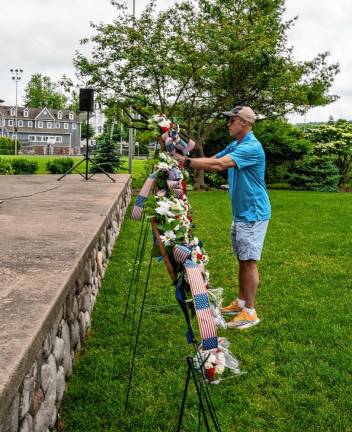 Wreaths are placed during the ceremony.