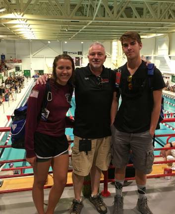 From left, Samantha Russell, Coach George Soutter and Jake Riva