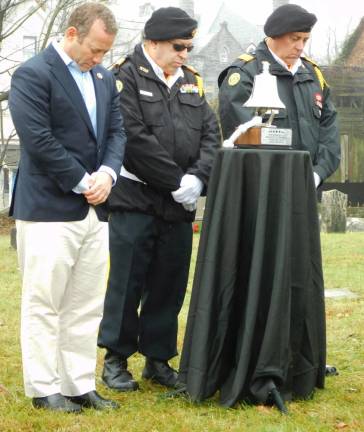 (L-R): Congressman Joshua Gottheimer (D- NJ5), American Legion Post 86 Honor Guard member Alan Abramson, and Honor Guard Commander Keith Ackerman bow their heads during the benediction delivered by Chaplain Father Ben Williams at the Old Newton Burial Ground on Saturday, Dec 14, 2019, as part of the annual Wreaths Across America ceremony.