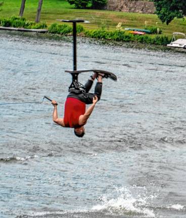 Damon Jenkins in a flip on his hydrofoil during the Ski Hawks’ show July 4.