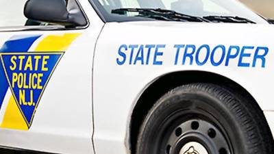 Trooper transporting prisoner is injured in crash