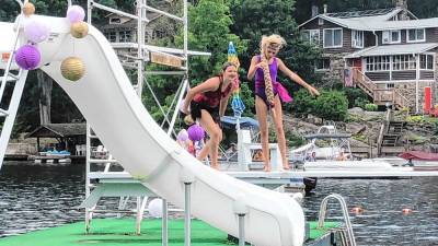 SS1 Erin Winkelman and Mackenzie Walsh act out a scene in ’Tangled,’ based on the German fairy tale ‘Rapunzel,’ on Sunday, Aug. 4 near the Cranberry Lake Community Club in Byram. (Photos by Kathy Shwiff)