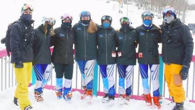 From left: Coach Rodney Calafati, Gabi Rodek, Madison Campisi, Rylee Selsor, captain Rachel Young, captain Claudia Calafati, Cora Moriarty, coach Brendan Moriarty (Photo provided)