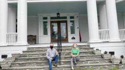 ART director Jeffrey Stocker (left) with musical director Sandy Stalter on the steps of the Columns Museum. The musicians will perform on the porch.