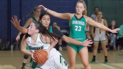 Sussex County's Madison Mailloux moves forward with the ball in the fourth quarter.