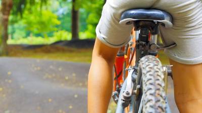 child on a bicycle- pump track outdoor