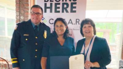 Newton Police Chief Michael Richards, Kellie Doucette, Becky Carlson