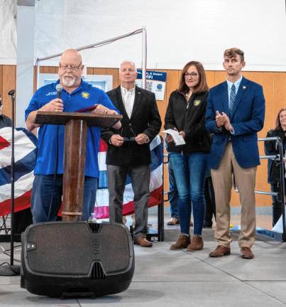 <b>Sussex County Commissioner Earl Schick speaks. Behind him, from left, are county clerk Jeffrey Parrott and Commissioners Jill Space and Jack DeGroot.</b>